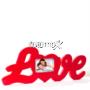 cornice in legno a forma di love con foto
